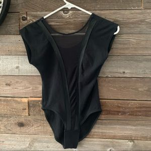 Black bodysuit with mesh fabric down middle